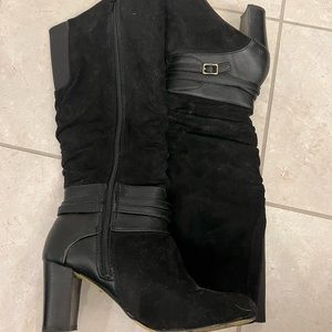 Size 6.5 wide calf black knee high boots!